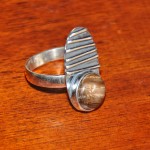 СРЕБЪРЕН ПРЪСТЕН С ОПАЛИЗИРАНО ДЪРВО